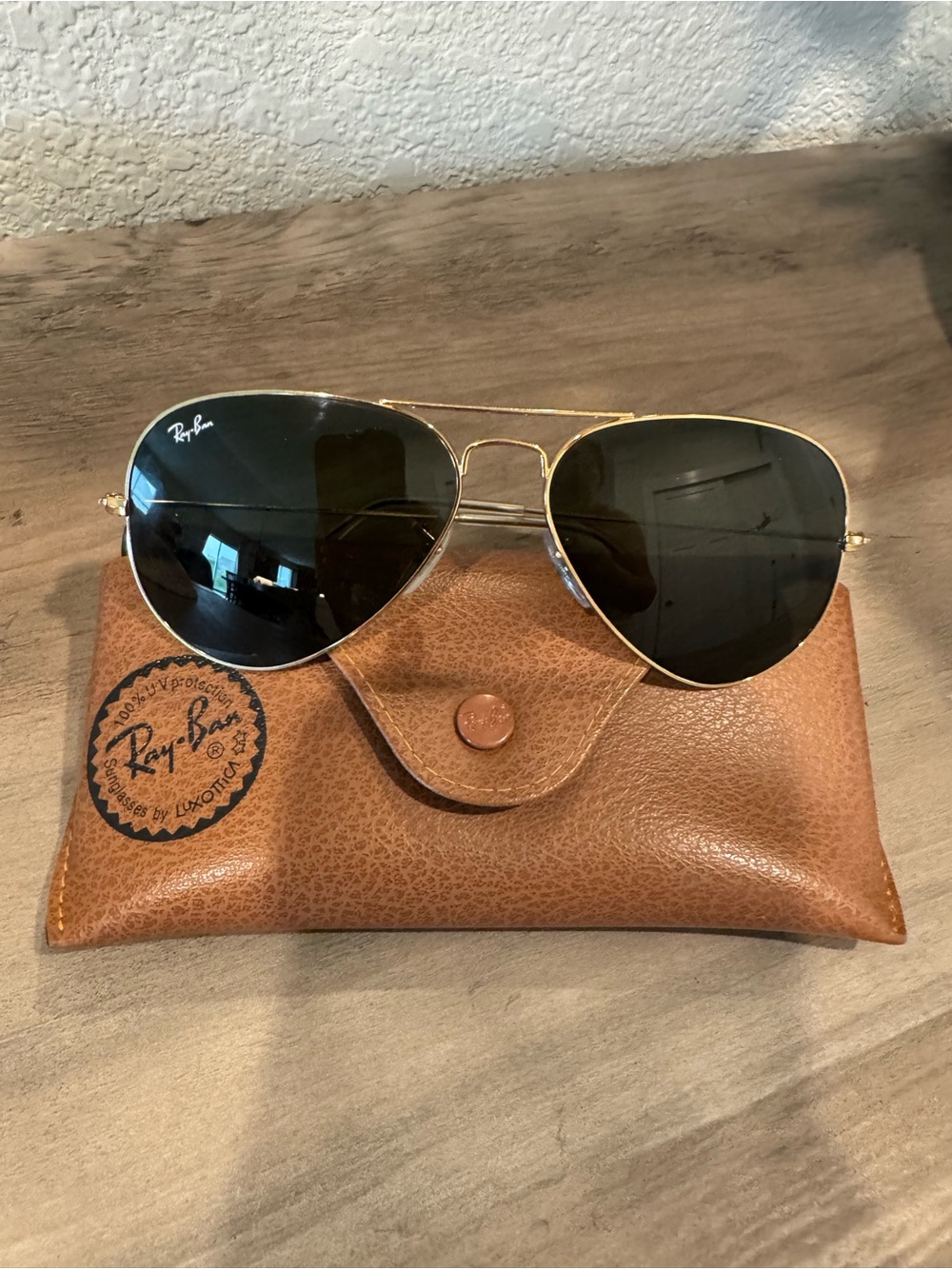 Ray-Ban RB3025 Aviator Sunglasses in Black and Gold